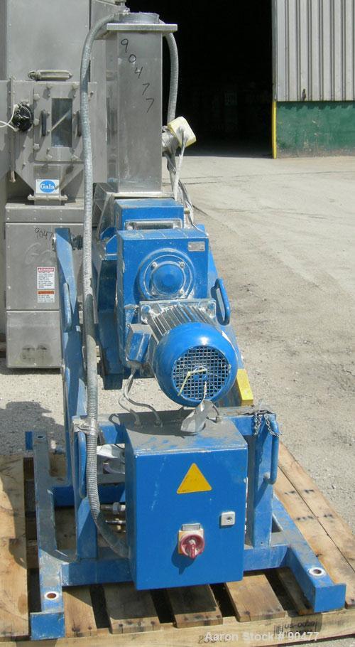 USED: K-tron twin screw side feeder, 80 mm, type K-T80-SF. Includes hopper. Driven by a 4kw (5.3 hp), 3/50/380/480 volt, 1440/1740 rpm geaarmotor, ratio 11.18 to 1. mounted on a carbon steel frame wi...