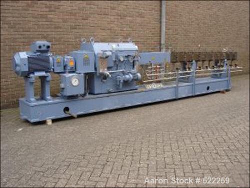 USED: Krupp-Werner Pfleiderer twin screw extruder, type Continua C-83S135E. 36:1 L/D, co-rotating. 9 housing sections, oil heated. 2 x 3.25" diameter x 117" long (83 mm x 3000 mm) screws. 55.5 hp/37 ...
