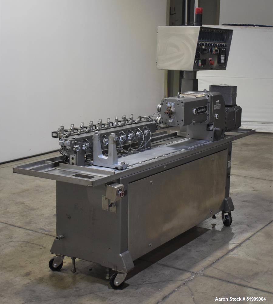 Used Leistritz Twin Screw Extruder, Model MIC 27/GG-40D. Throughput rates approximate 10 to 80 lbs/hr. 40:1 L/D. (2) Screws approximate 27mm (1") diameter x 48" long, Co-rotating. Electrically heated...
