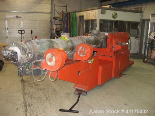 Used Maris TM 85 Twin Screw Extruder. Co-rotating, 2 x 3.35" (2 x 85 mm) screws, L/D 24, 36 hp/27 kW DC motor with inverter, string die for 16 strings, 11 heating zones and control panel.