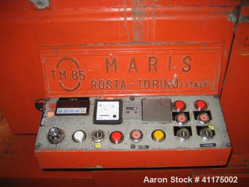 Used Maris TM 85 Twin Screw Extruder. Co-rotating, 2 x 3.35" (2 x 85 mm) screws, L/D 24, 36 hp/27 kW DC motor with inverter, string die for 16 strings, 11 heating zones and control panel.