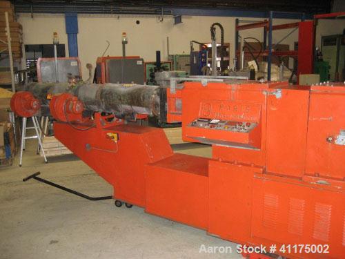 Used Maris TM 85 Twin Screw Extruder. Co-rotating, 2 x 3.35" (2 x 85 mm) screws, L/D 24, 36 hp/27 kW DC motor with inverter, string die for 16 strings, 11 heating zones and control panel.