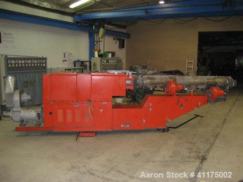 Used Maris TM 85 Twin Screw Extruder. Co-rotating, 2 x 3.35" (2 x 85 mm) screws, L/D 24, 36 hp/27 kW DC motor with inverter, string die for 16 strings, 11 heating zones and control panel.