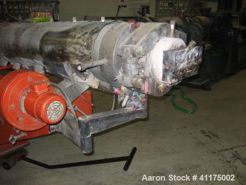 Used Maris TM 85 Twin Screw Extruder. Co-rotating, 2 x 3.35" (2 x 85 mm) screws, L/D 24, 36 hp/27 kW DC motor with inverter, string die for 16 strings, 11 heating zones and control panel.