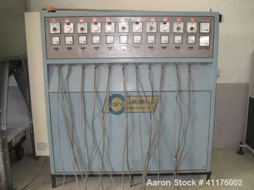 Used Maris TM 85 Twin Screw Extruder. Co-rotating, 2 x 3.35" (2 x 85 mm) screws, L/D 24, 36 hp/27 kW DC motor with inverter, string die for 16 strings, 11 heating zones and control panel.