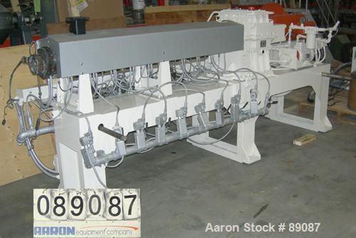 Used Maris 40 MM Twin Screw Extruder, Model TM40WW. Approximately 40:1 L/D ratio. Co-rotating screw design. 9 barrel sections measuring from the back of the feed barrel to end barrel is 62", (1) vent...