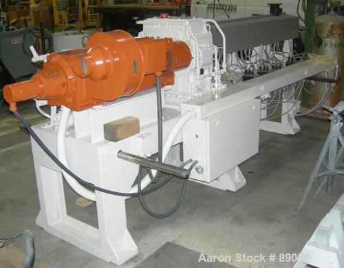 Used Maris 40 MM Twin Screw Extruder, Model TM40WW. Approximately 40:1 L/D ratio. Co-rotating screw design. 9 barrel sections measuring from the back of the feed barrel to end barrel is 62", (1) vent...