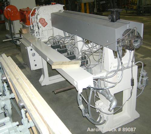 Used Maris 40 MM Twin Screw Extruder, Model TM40WW. Approximately 40:1 L/D ratio. Co-rotating screw design. 9 barrel sections measuring from the back of the feed barrel to end barrel is 62", (1) vent...