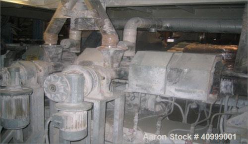 Used Maris Twin Screw Extrusion Line, Type TM70W/020391. 70mm, 36:1 L/D. Electrically heated, water cooled. Max screw speed 525 via a gearbox by a 180 kW-400 volt/50 cycle/3 ph main motor. Frame moun...