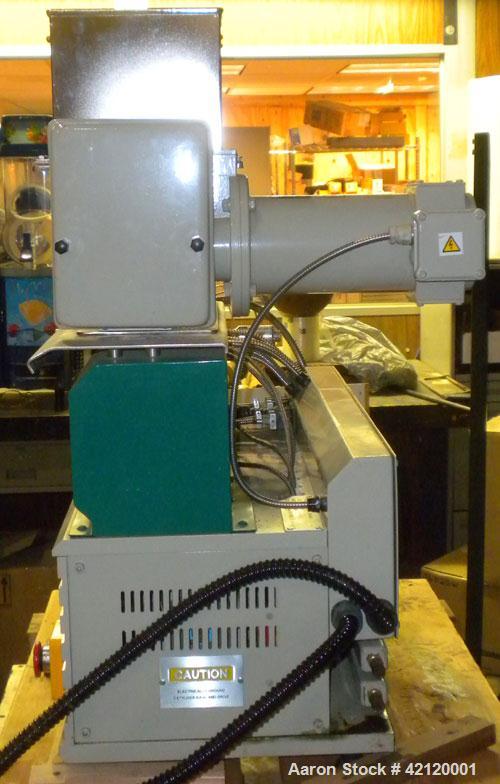 Used Prism 16mm Twin Screw Extruder, Model TSE-16-TC. Co-rotating intermeshing side by side screw design. Approximate 15 to 1 L/D ratio. Clam sheel design barrel. Wtare cooled feed section. Electrica...