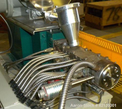 Used Prism 16mm Twin Screw Extruder, Model TSE-16-TC. Co-rotating intermeshing side by side screw design. Approximate 15 to 1 L/D ratio. Clam sheel design barrel. Wtare cooled feed section. Electrica...