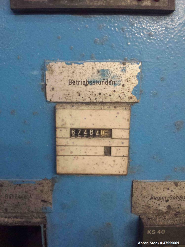 Used Theysohn Twin Screw Extruder, Type N 60-36D 5096. 2.34" (60mm) diameter 33:1 L/D. Co-rotating. 8 housing sections, electrically heated, water cooled. (1) Vent port. Max screw speed 450 RPM via a...