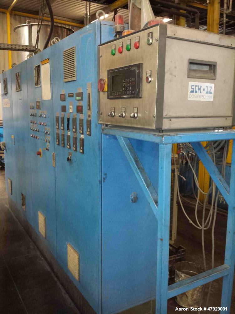 Used Theysohn Twin Screw Extruder, Type N 60-36D 5096. 2.34" (60mm) diameter 33:1 L/D. Co-rotating. 8 housing sections, electrically heated, water cooled. (1) Vent port. Max screw speed 450 RPM via a...