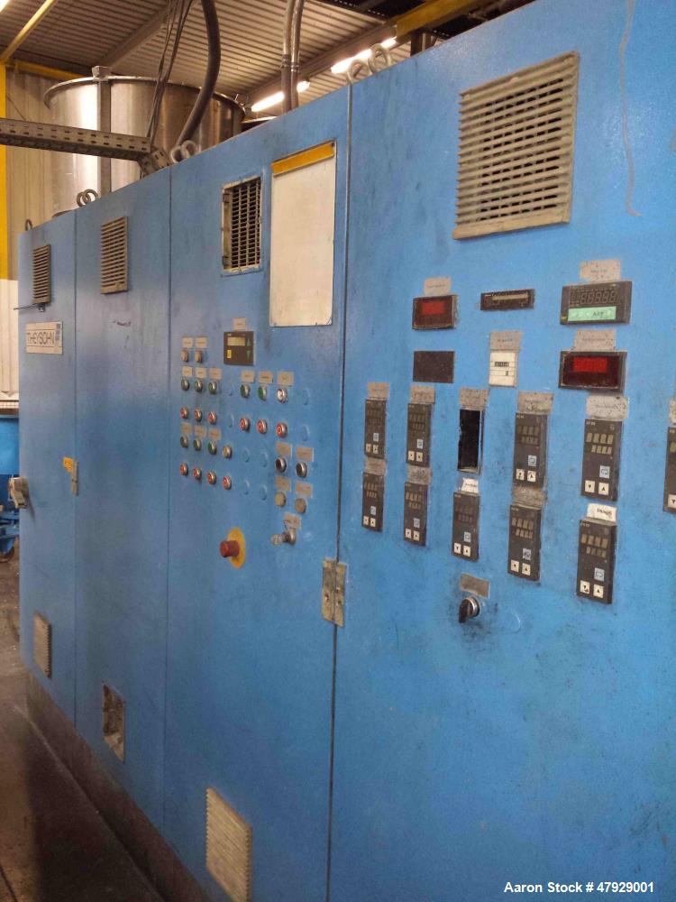 Used Theysohn Twin Screw Extruder, Type N 60-36D 5096. 2.34" (60mm) diameter 33:1 L/D. Co-rotating. 8 housing sections, electrically heated, water cooled. (1) Vent port. Max screw speed 450 RPM via a...