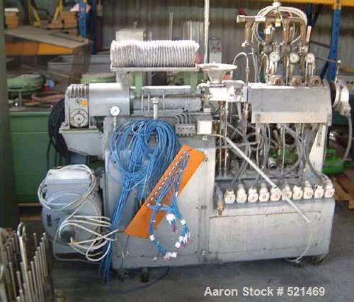 USED: Werner & Pfleiderer lab size twin screw extruder, type ZDS-K28.28mm diameter screws, co-rotating. Electrically heated, water cooled.Driven via a 4.5 hp/3 kw Spez gearbox, type CUHW80 by a 4.5 h...