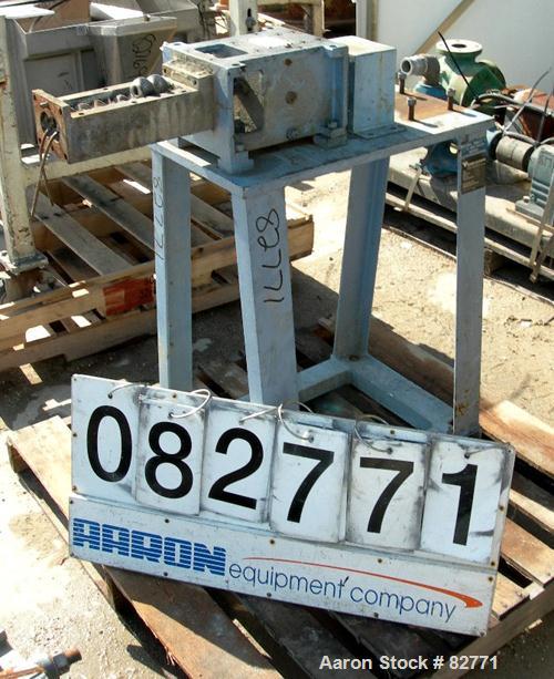 USED: Werner Pfleiderer twin screw side feeder, model ZSB-40. Unit requires 2 shafts and motor. Last used with a 58mm extruder. Mounted on a carbon steel stand. Built 1988.