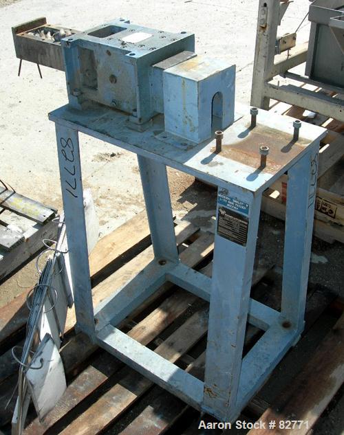 USED: Werner Pfleiderer twin screw side feeder, model ZSB-40. Unit requires 2 shafts and motor. Last used with a 58mm extruder. Mounted on a carbon steel stand. Built 1988.