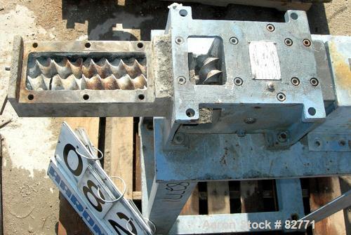 USED: Werner Pfleiderer twin screw side feeder, model ZSB-40. Unit requires 2 shafts and motor. Last used with a 58mm extruder. Mounted on a carbon steel stand. Built 1988.