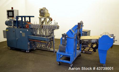 Used Coperion Werner Pfleiderer 25mm Twin Screw Extruder, Type ZSK-25. Manufactured New 2002. Approximate 40 to 1 L/D ratio. Co-Rotating intermeshing side by side screw design. 12 total Barrel sectio...