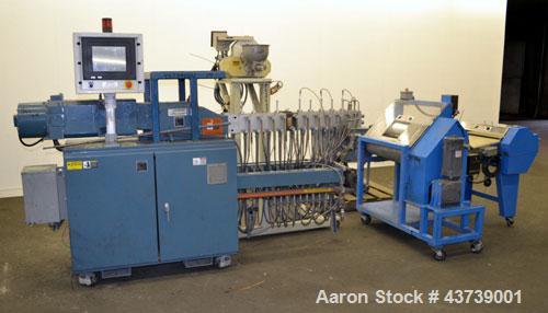 Used Coperion Werner Pfleiderer 25mm Twin Screw Extruder, Type ZSK-25. Manufactured New 2002. Approximate 40 to 1 L/D ratio. Co-Rotating intermeshing side by side screw design. 12 total Barrel sectio...