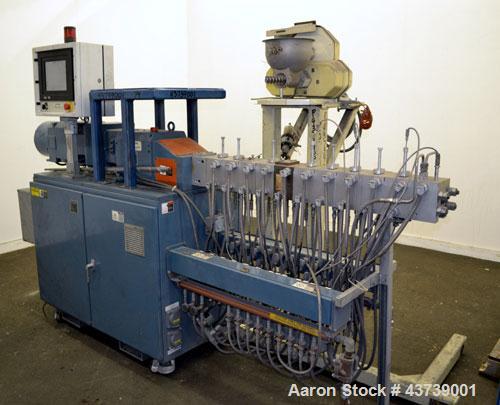 Used Coperion Werner Pfleiderer 25mm Twin Screw Extruder, Type ZSK-25. Manufactured New 2002. Approximate 40 to 1 L/D ratio. Co-Rotating intermeshing side by side screw design. 12 total Barrel sectio...