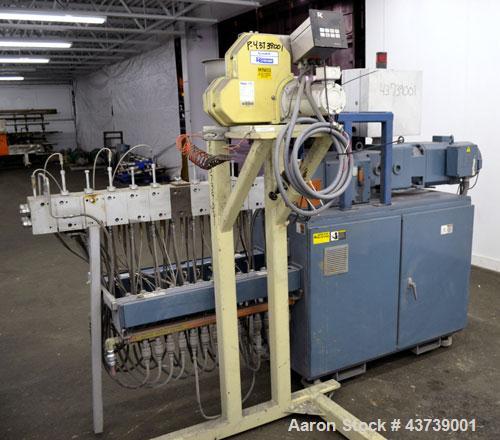 Used Coperion Werner Pfleiderer 25mm Twin Screw Extruder, Type ZSK-25. Manufactured New 2002. Approximate 40 to 1 L/D ratio. Co-Rotating intermeshing side by side screw design. 12 total Barrel sectio...