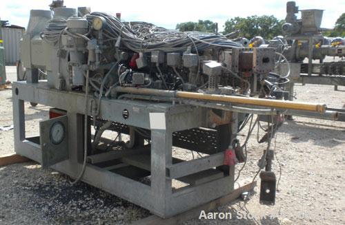 Used Werner Pfleiderer 40mm Twin Screw Extruder, Type ZSK-40. Co-rotating intermeshing side by side screw design. Approximate 33 to 1 L/D ratio. 5 barrel sections, 1 vented, 1 feed section. Electrica...