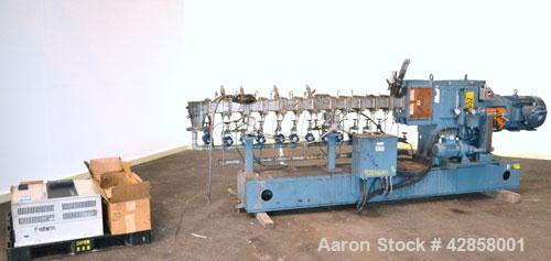 Used Werner Pfleiderer 40mm Twin Screw Extruder, Type ZSK-40. Co-rotating intermeshing side by side screw design. Approximate 40 to 1 L/D ratio. (11) Barrel sections, (1) feed section. Water cooled b...