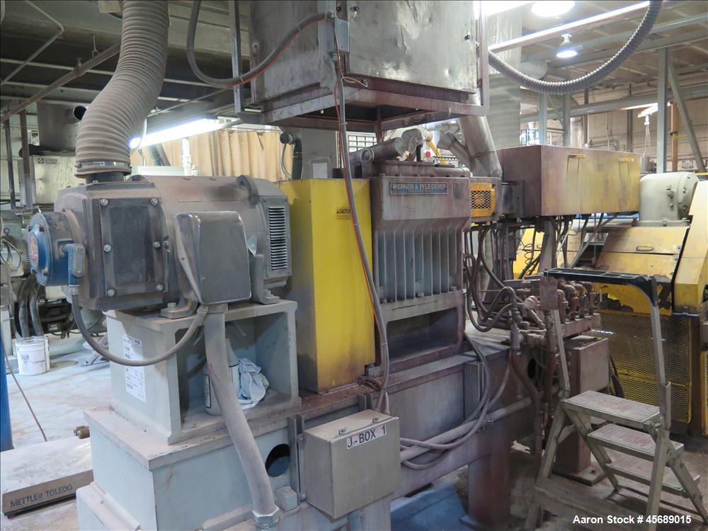 Used Werner & Pfleiderer 58mm Twin Screw Extruder, Model ZSK-58, Serial # 180913.  75 HP DC motor.  Includes:  North American Process Cooling Belt, 902M series feeder, long barrel.  Controls and Driv...