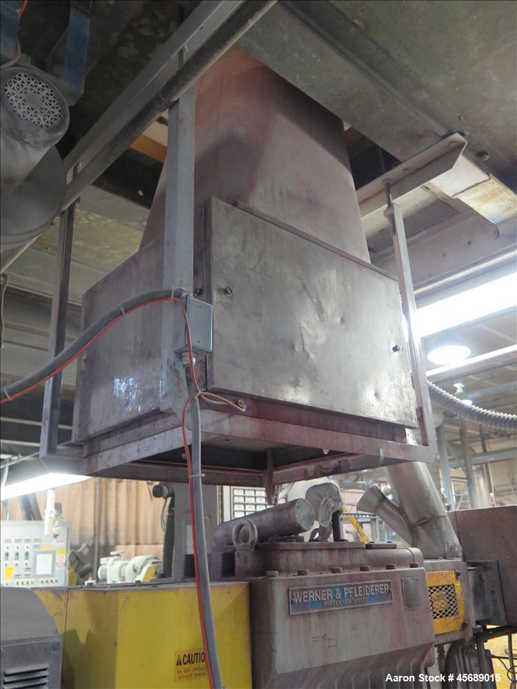 Used Werner & Pfleiderer 58mm Twin Screw Extruder, Model ZSK-58, Serial # 180913.  75 HP DC motor.  Includes:  North American Process Cooling Belt, 902M series feeder, long barrel.  Controls and Driv...
