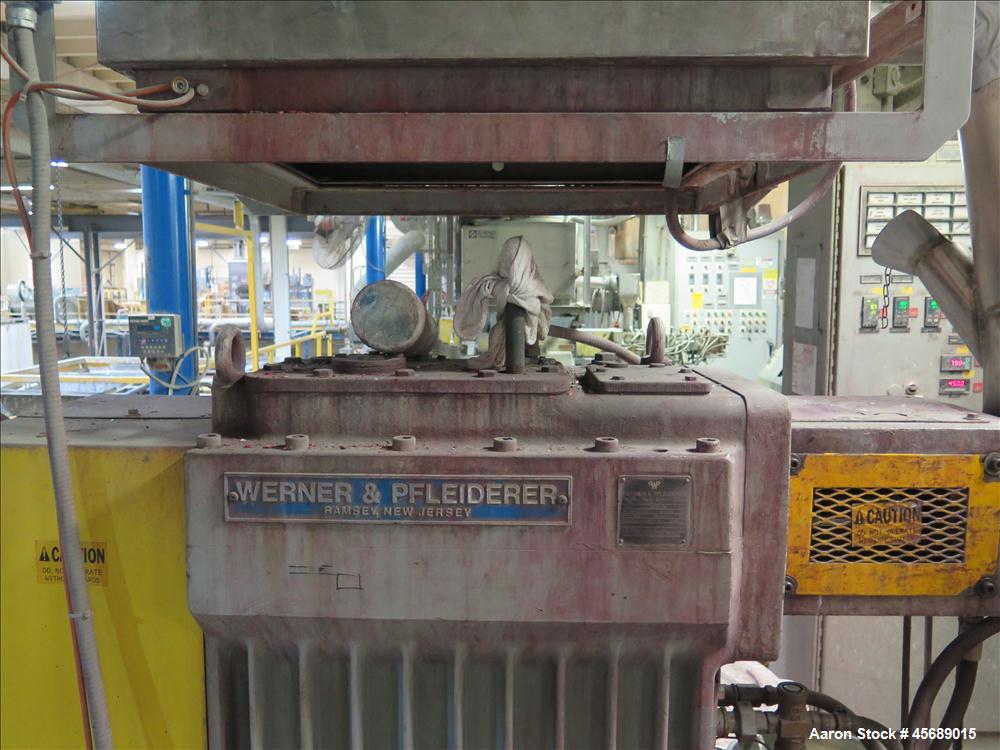 Used Werner & Pfleiderer 58mm Twin Screw Extruder, Model ZSK-58, Serial # 180913.  75 HP DC motor.  Includes:  North American Process Cooling Belt, 902M series feeder, long barrel.  Controls and Driv...