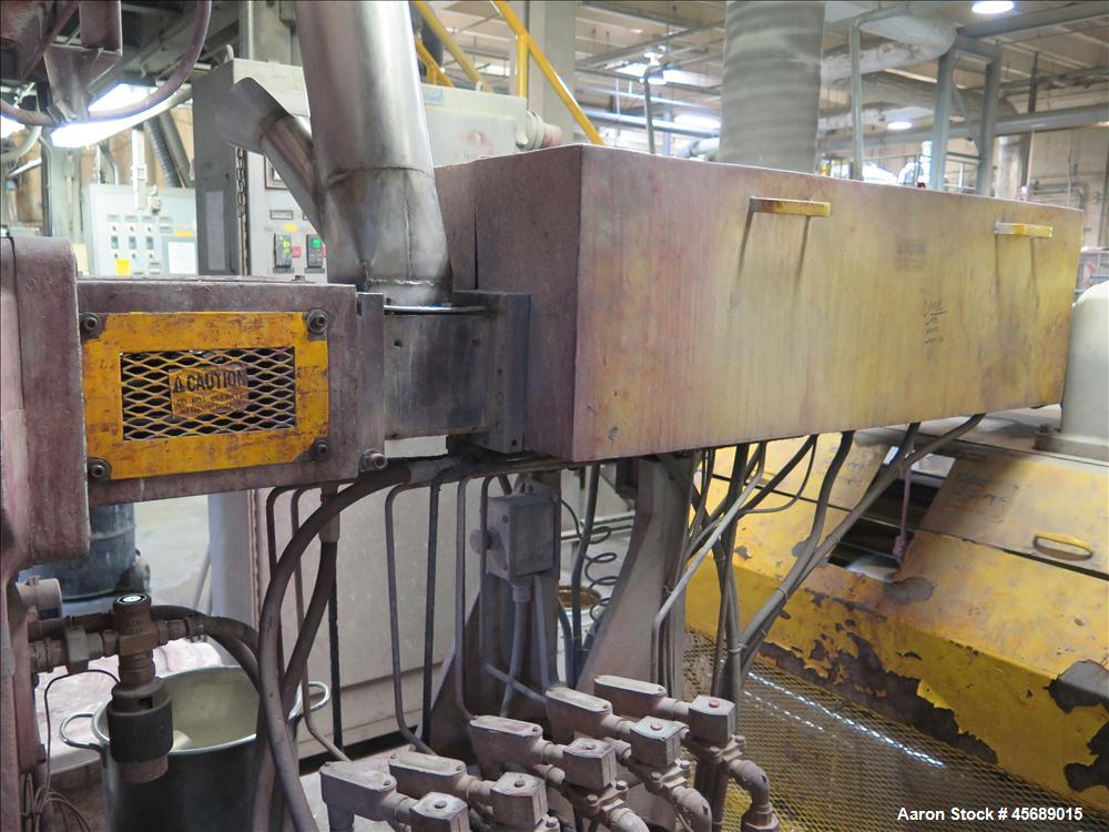 Used Werner & Pfleiderer 58mm Twin Screw Extruder, Model ZSK-58, Serial # 180913.  75 HP DC motor.  Includes:  North American Process Cooling Belt, 902M series feeder, long barrel.  Controls and Driv...