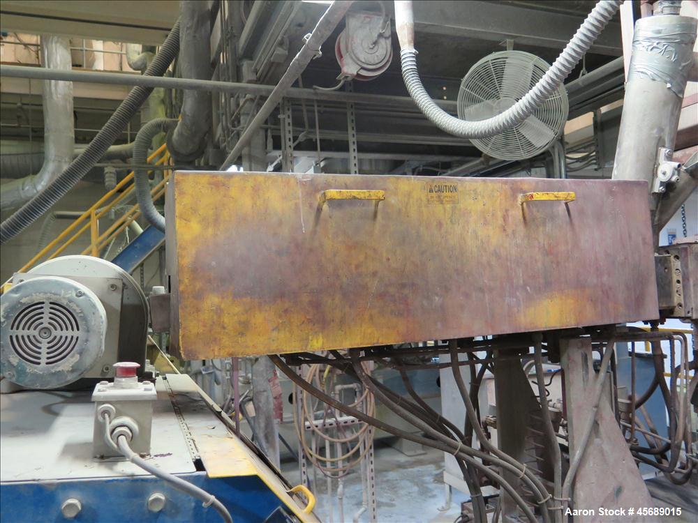 Used Werner & Pfleiderer 58mm Twin Screw Extruder, Model ZSK-58, Serial # 180913.  75 HP DC motor.  Includes:  North American Process Cooling Belt, 902M series feeder, long barrel.  Controls and Driv...
