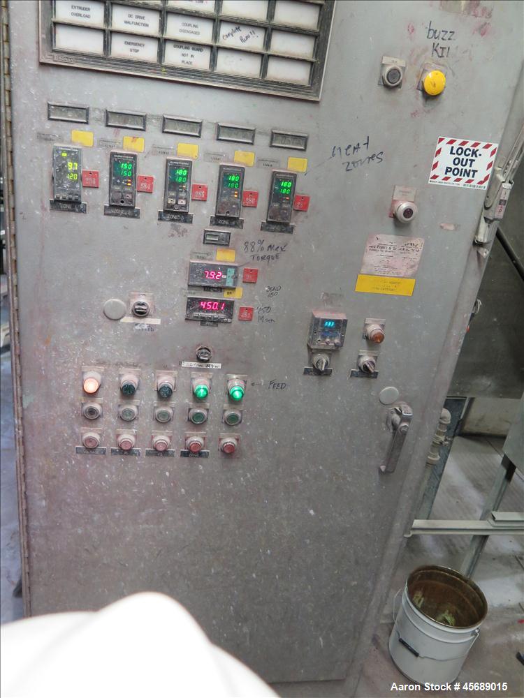 Used Werner & Pfleiderer 58mm Twin Screw Extruder, Model ZSK-58, Serial # 180913.  75 HP DC motor.  Includes:  North American Process Cooling Belt, 902M series feeder, long barrel.  Controls and Driv...
