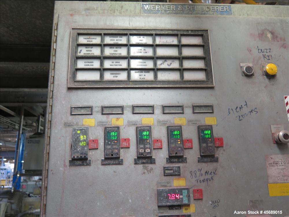 Used Werner & Pfleiderer 58mm Twin Screw Extruder, Model ZSK-58, Serial # 180913.  75 HP DC motor.  Includes:  North American Process Cooling Belt, 902M series feeder, long barrel.  Controls and Driv...