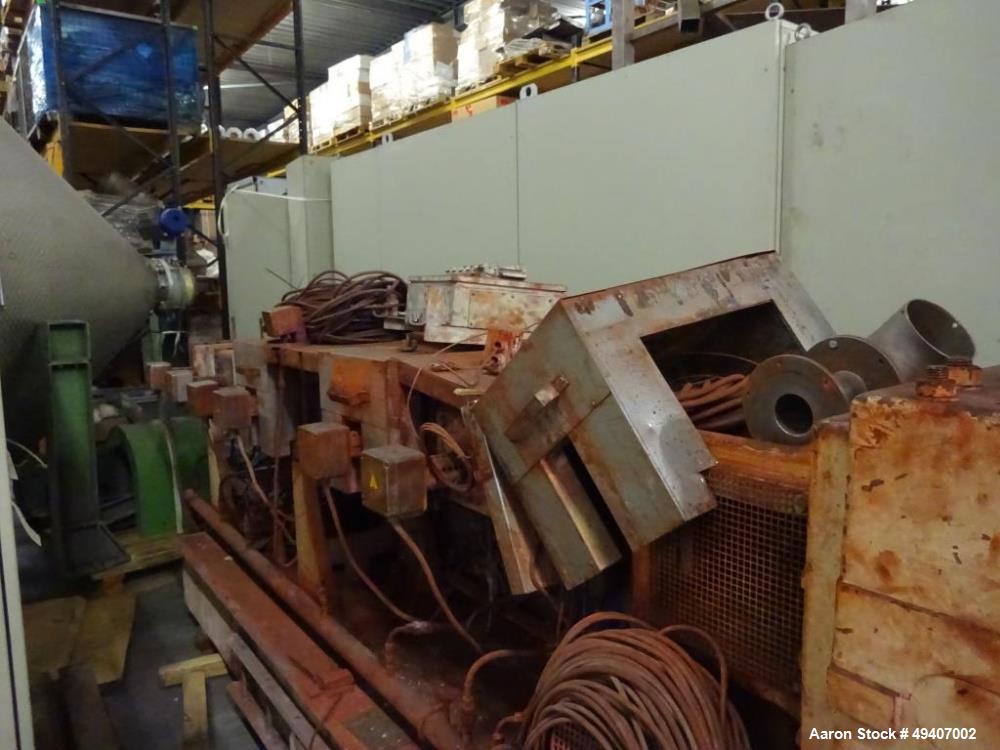 Used Werner & Pfleiderer ZSK 92 F385E Twin Screw Extruder. 32:1 L/D. Co-rotating, 8 housing sections, electrically heated, water cooled. Max screw speed is 300 rpm via a gearbox by a 447 hp/298Kw-144...