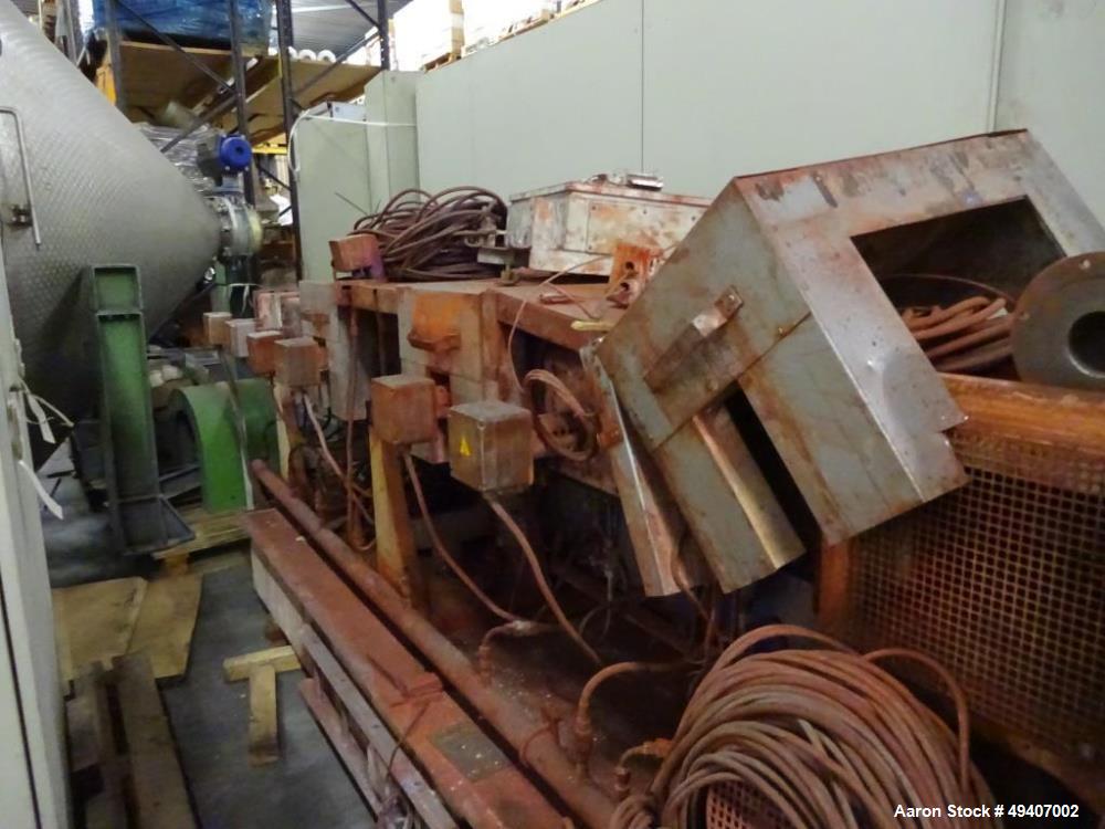 Used Werner & Pfleiderer ZSK 92 F385E Twin Screw Extruder. 32:1 L/D. Co-rotating, 8 housing sections, electrically heated, water cooled. Max screw speed is 300 rpm via a gearbox by a 447 hp/298Kw-144...