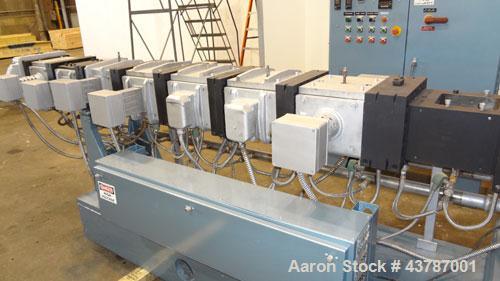 Used Werner & Pfleiderer 92mm Twin Screw Extruder, Type ZSK-92F-385E. Approximate 30 to 1 L/D ratio. Co-rotating intermeshing side by side screw design. 7 Barrel sections, (1) feed section with hoppe...