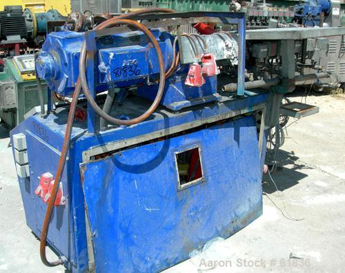 USED: Werner Pfleiderer lab size twin screw extruder. 30 mm screw diameter, model ZSK30M0/2P. Approx 30:1 L/D ratio. Co-rotating screw design. 9 zone electrically heated, water cooled barrel. Driven ...