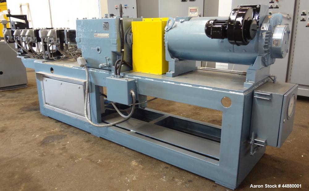 Used Werner & Pfleiderer 40mm Twin Screw Extruder, Type ZSK40F-32.5E. Approximate 40 to 1 L/D ratio. Co-Rotating intermeshing side by side screw design. 10 Barrel sections, with (1) feed section, (1)...