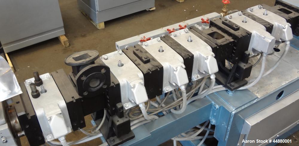 Used Werner & Pfleiderer 40mm Twin Screw Extruder, Type ZSK40F-32.5E. Approximate 40 to 1 L/D ratio. Co-Rotating intermeshing side by side screw design. 10 Barrel sections, with (1) feed section, (1)...