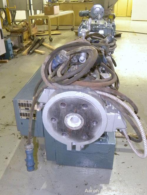 Used Werner Pfleiderer 57mm Twin Screw Extruder, Type ZSK57. Co-Rotating intermeshing side by side screw design. 7 Barrel sections, (1) feed section, no hopper, electrically heated, water cooled (no ...