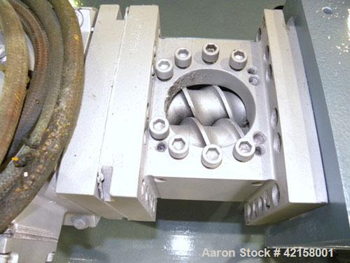 Used Werner Pfleiderer 57mm Twin Screw Extruder, Type ZSK57. Co-Rotating intermeshing side by side screw design. 7 Barrel sections, (1) feed section, no hopper, electrically heated, water cooled (no ...