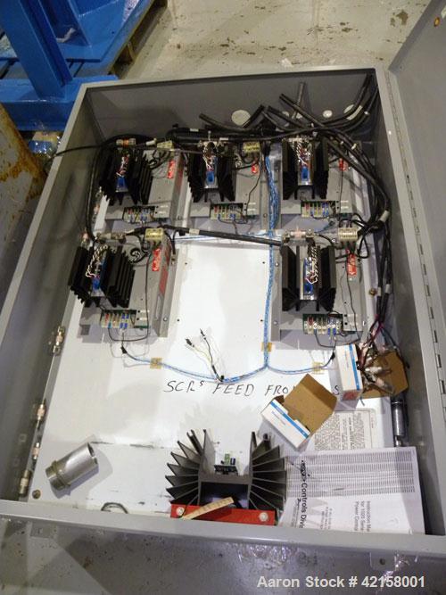 Used Werner Pfleiderer 57mm Twin Screw Extruder, Type ZSK57. Co-Rotating intermeshing side by side screw design. 7 Barrel sections, (1) feed section, no hopper, electrically heated, water cooled (no ...