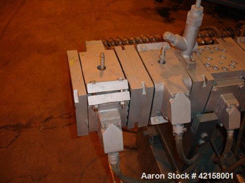 Used Werner Pfleiderer 57mm Twin Screw Extruder, Type ZSK57. Co-Rotating intermeshing side by side screw design. 7 Barrel sections, (1) feed section, no hopper, electrically heated, water cooled (no ...