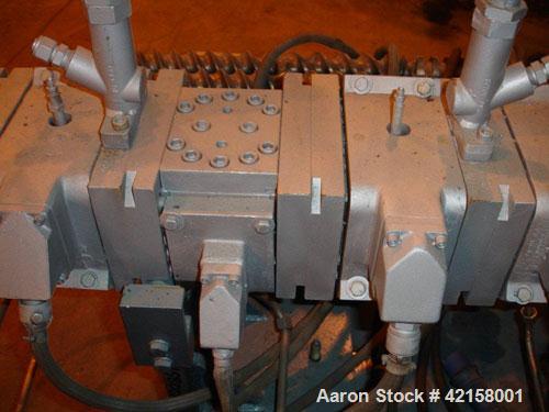 Used Werner Pfleiderer 57mm Twin Screw Extruder, Type ZSK57. Co-Rotating intermeshing side by side screw design. 7 Barrel sections, (1) feed section, no hopper, electrically heated, water cooled (no ...