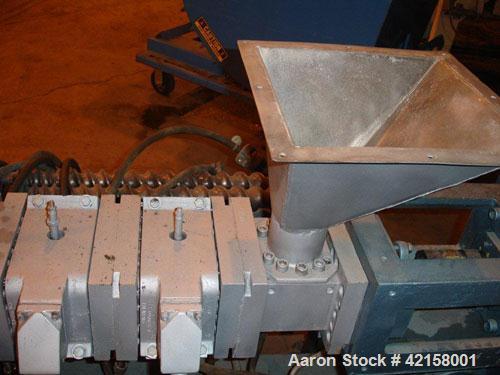 Used Werner Pfleiderer 57mm Twin Screw Extruder, Type ZSK57. Co-Rotating intermeshing side by side screw design. 7 Barrel sections, (1) feed section, no hopper, electrically heated, water cooled (no ...