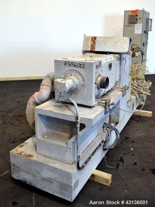 Used Werner & Pfleiderer 70mm Twin Screw Extruder, Type ZSK70F-175E. Approximate 18 to 1 L/D ratio. Approximate 40-1/2" centerline height. Co-Rotating intermeshing side by side screw design. Capacity...