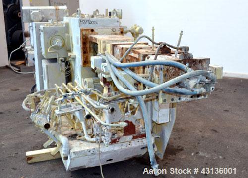 Used Werner & Pfleiderer 70mm Twin Screw Extruder, Type ZSK70F-175E. Approximate 18 to 1 L/D ratio. Approximate 40-1/2" centerline height. Co-Rotating intermeshing side by side screw design. Capacity...