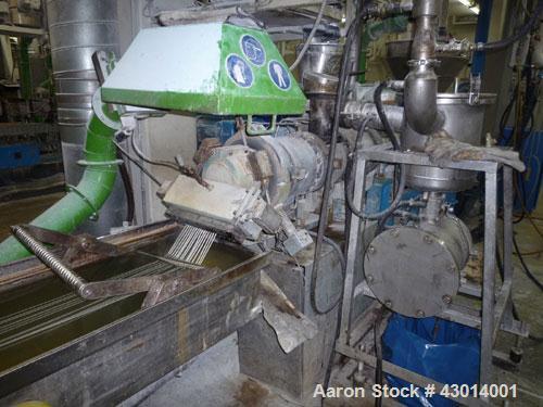 Used Berstoff Twin Screw Extruder, type ZE60A-33D, Co-rotating. Max screw speed 500 RPM via a Flender gearbox, ratio 5:1 by a 150KW/225HP-2500 RPM-380volt/50cycle/3Ph motor. incl. 2 x side feeder and...